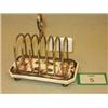 Image 1 : Victorian silver plated and china toast rack...