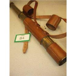 Brass leather cased telescope £100 - 150...