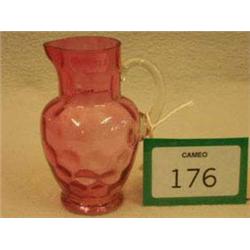 Small cranberry baluster shaped jug, 5" high...