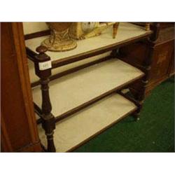 Victorian mahogany three tiered buffet on tur...