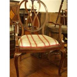 Superb mahogany open armchair with round shap...