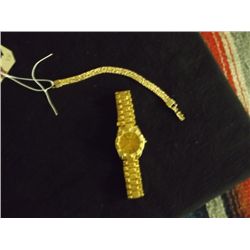 Gold Color Costume Bracelet & Men's Watch The bracelet is approx. 7" long, the watch is a Quartz and