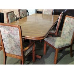 Solid oak dining table with 3 leafs and 6 chairs