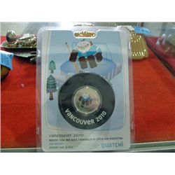Vancouver 2010 olympic mascot coin and puck set