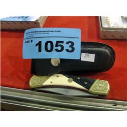 Lock blade knife with leather belt pouch