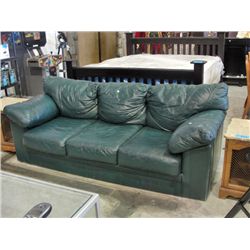Green leather sofa