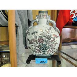Oriental ceramic vase with stand
