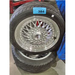 Pair of Toyo low profile tires with alloy rims
