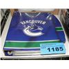 Image 1 : Vancouver canucks collector album filled with NHL