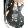 Image 1 : M electric guitar with soft shell axe carrying