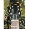 Image 2 : M electric guitar with soft shell axe carrying