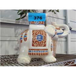 Ceramic elephant plant stand