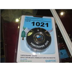 Vancouver 2010 olympic mascot coin and puck set