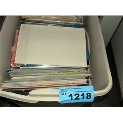rubbermaid container of comics, magazines, etc