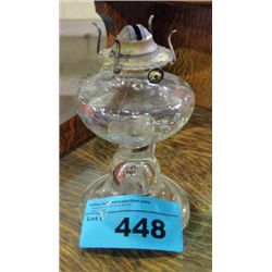 Early 1900s glass finger hold oil lamp