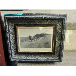 Framed black and white war scene print