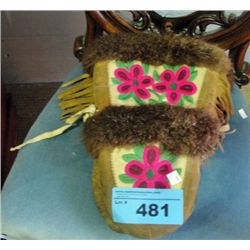 Pair of hand crafted native fur lined gloves