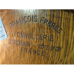 Lighted oak barrel wine cellar