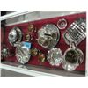 Image 1 : Showcase filled with assorted silverplate serving