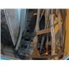 Image 1 : Bin filled with assorted farming tools