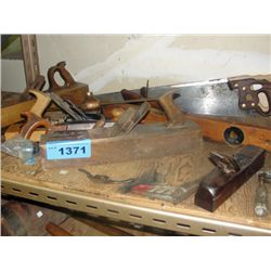 Shelf lot of vintage wood workers planes and