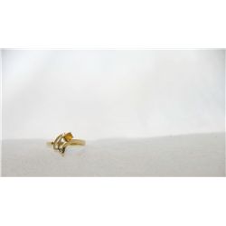 Ladies 10k gold with yellow gemstone ring