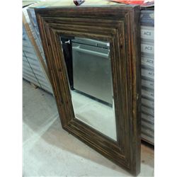 Wood framed bevelled wall mirror