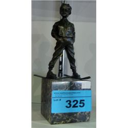 Bronze child skiier on marble pedastol