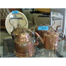 Collection of 4 early copper kettles
