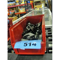 Small red bin of metal clamps