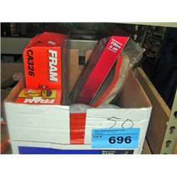 Box of assorted automotive maintenance parts