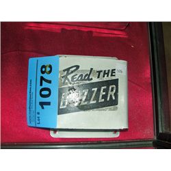 Vintage read the buzzer metal pamphlet holder