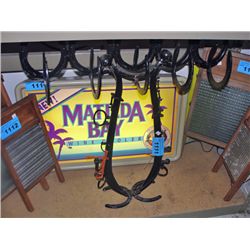 Vintage horse tack on vintage stand