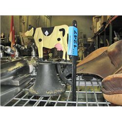 Cast metal cow dinner bell