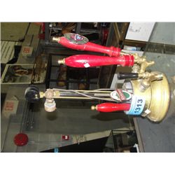 Vintage brass bar beer taps