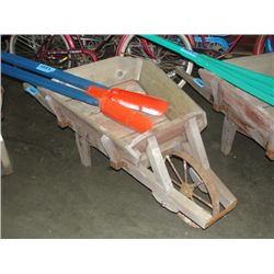 Rustic wooden wheel barrow with steel wheel