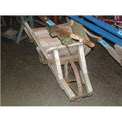 Rustic wooden wheel barrow with steel wheel
