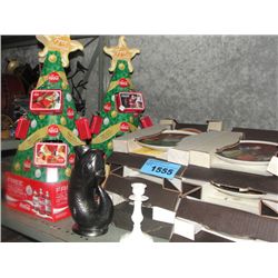 2 christmas tree coca cola displays, 8 collectors plates, candle holder and a vase