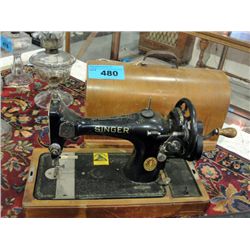 Vintage singer hand crank sewing machine with