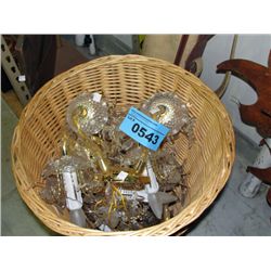 Wicker basket filled with faux crystal and brass