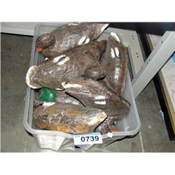 Plastic storage bin of assorted duck hunters