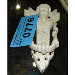 Cast metal angel door knocker