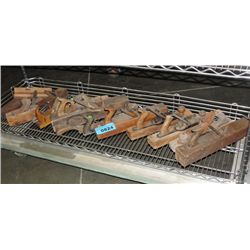 Shelf lot of wooden wood workers planes and