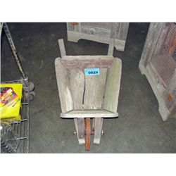 Rustic wooden wheel barrow with steel wheel