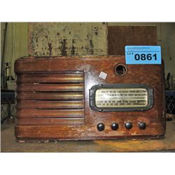 Vintage silver tone wood cased table radio