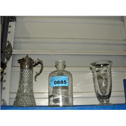 Glass water pitcher, medicine jug and a vase