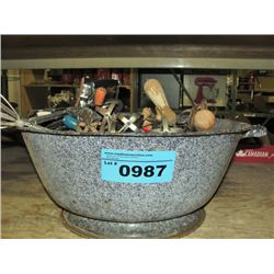Granite ware bowl filled with assorted beaters