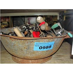 Granite ware bowl filled with assorted beaters