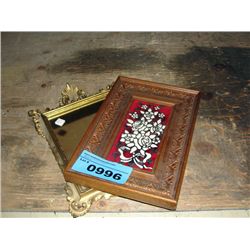 Small guild framed mirror and a framed clay tile