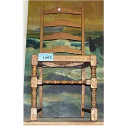 Circa 1910 oak ladder back with rush seat side